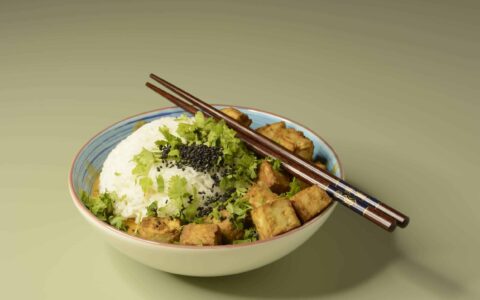 bowl of thai curry with tofu.